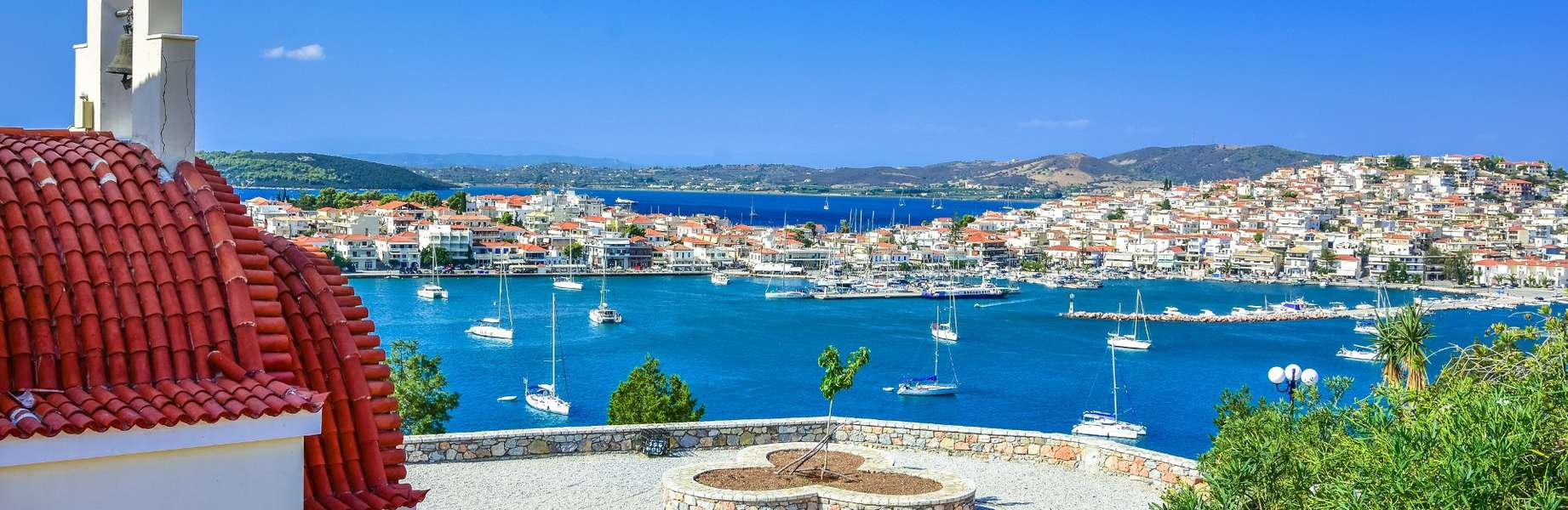 Explore the Greek Islands Aboard a Catamaran with Skipper and Hostess